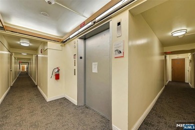 This professionally updated 1-bedroom, first-floor unit at