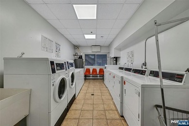 This professionally updated 1-bedroom, first-floor unit at