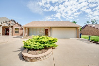 Welcome to this beautifully maintained 2 bed, 2 bath patio home