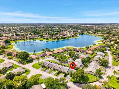 Beautiful corner townhome located in Devon-Aire Villas in - photo 3