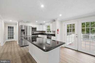 Welcome to this beautifully maintained Dutch Colonial nestled in - photo 8