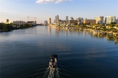 Live where the city meets the water. Welcome home to this fully