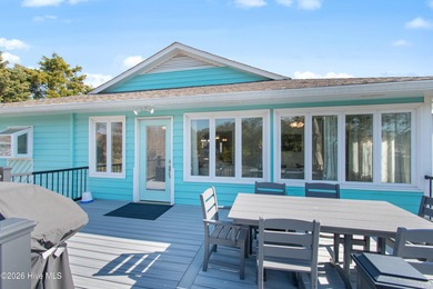 Pull up to your nautical blue piling home on Pine Island and