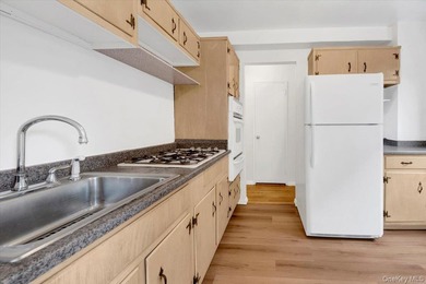 Woodlawn Heights! Welcome to this oversized co-op. A commuters