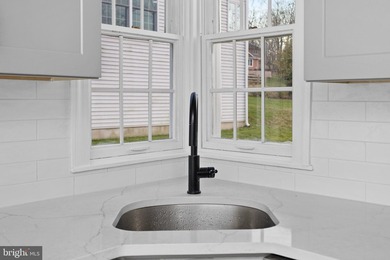 Welcome home to this beautifully renovated expanded Cape Cod - photo 17