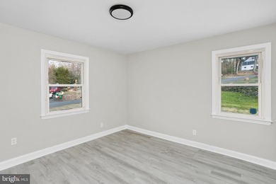 Welcome home to this beautifully renovated expanded Cape Cod - photo 18