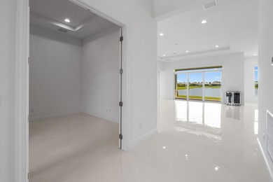 Better than new! 4 BR 4.5 BA with den, bonus room and 3 CG. This - photo 6