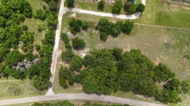 Peaceful .65 Acre Homesite with Boat Ramp Access in April Cove - photo 2