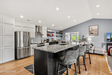 Welcome to this beautifully updated single-story villa in the - photo 17