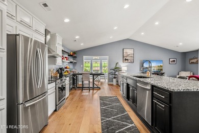 Welcome to this beautifully updated single-story villa in the - photo 18