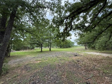Peaceful .65 Acre Homesite with Boat Ramp Access in April Cove - photo 21