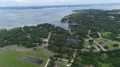 Peaceful .65 Acre Homesite with Boat Ramp Access in April Cove - photo 24