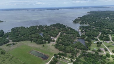 Peaceful .65 Acre Homesite with Boat Ramp Access in April Cove - photo 25