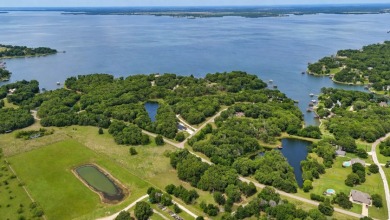 Peaceful .65 Acre Homesite with Boat Ramp Access in April Cove - photo 33