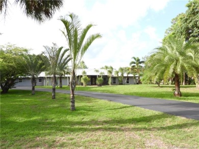 Lake Home For Sale in Palm City, Florida