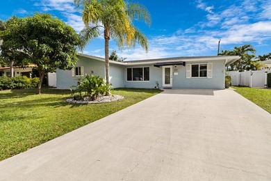Completely updated and move-in ready, this 3-bedroom, 2-bath - photo 2