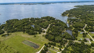 Peaceful .65 Acre Homesite with Boat Ramp Access in April Cove - photo 31