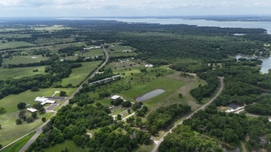 Peaceful .65 Acre Homesite with Boat Ramp Access in April Cove - photo 8
