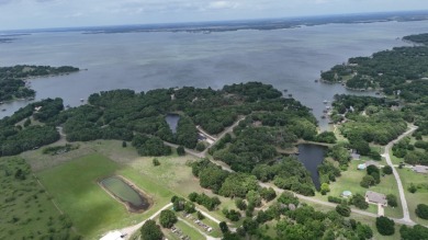 Peaceful .65 Acre Homesite with Boat Ramp Access in April Cove - photo 19