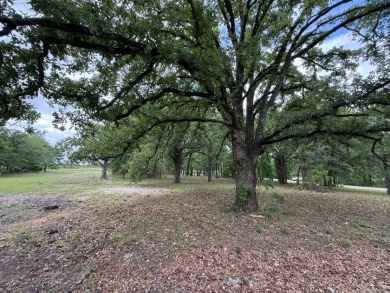 Peaceful .65 Acre Homesite with Boat Ramp Access in April Cove - photo 7