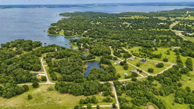 Peaceful .65 Acre Homesite with Boat Ramp Access in April Cove - photo 32