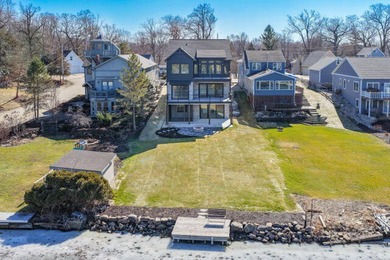 The pinnacle of refined lakefront living awaits on Browns Lake - Lake Home For Sale in Burlington, Wisconsin