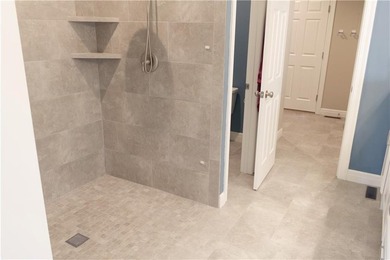 Upgrades galore in southwest Olathe. Zero-entry (no steps!)