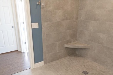 Upgrades galore in southwest Olathe. Zero-entry (no steps!)