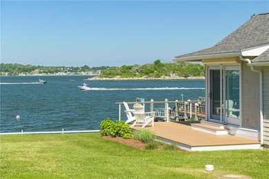 Set along the edge of the Sakonnet River in Tiverton, this - photo 17
