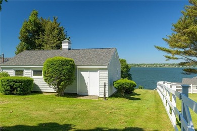 Set along the edge of the Sakonnet River in Tiverton, this - photo 22