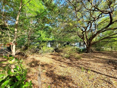 Handyman special on a .61-acre lot located just a few steps away - Lake Home Sale Pending in Elloree, South Carolina