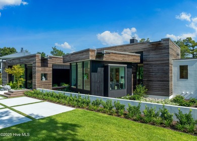 The Cypress House is a rare modern resort estate in Landfall's