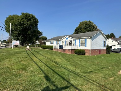 Inviting one-level home situated on a spacious corner lot with a