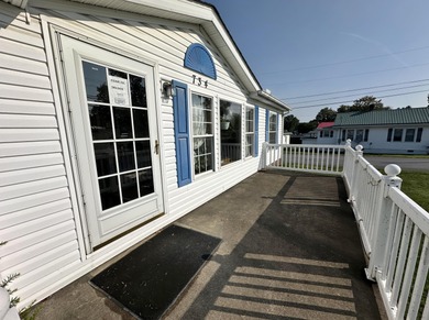 Inviting one-level home situated on a spacious corner lot with a