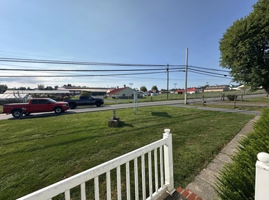 Inviting one-level home situated on a spacious corner lot with a