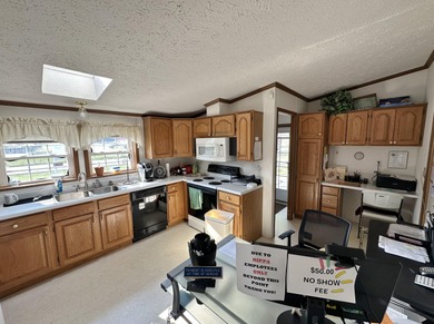 Inviting one-level home situated on a spacious corner lot with a