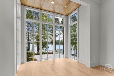 WELCOME TO THE PINNACLE OF LAKESIDE LUXURY, NESTLED WITHIN THE - photo 42