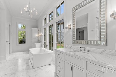 WELCOME TO THE PINNACLE OF LAKESIDE LUXURY, NESTLED WITHIN THE - photo 47