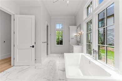 WELCOME TO THE PINNACLE OF LAKESIDE LUXURY, NESTLED WITHIN THE - photo 48