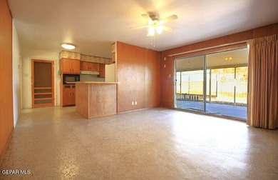 This charming single-level brick home in the highly desirable