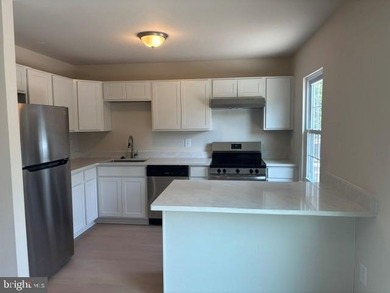 Don't miss this one completely redone with upgraded LVP flooring - photo 2