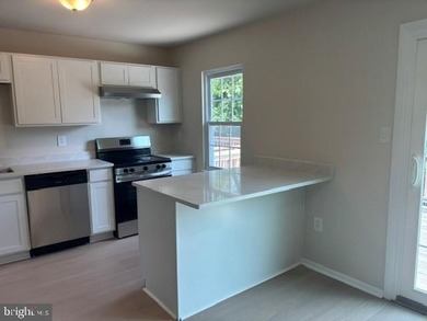 Don't miss this one completely redone with upgraded LVP flooring - photo 4