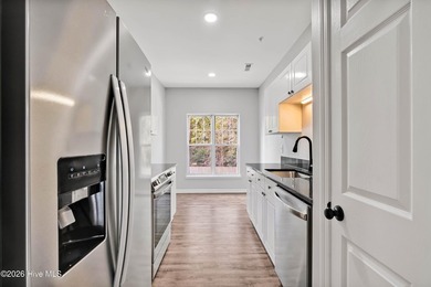 This updated 2-bedroom, 2-bath second-floor condo offers a - photo 15