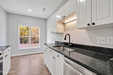 This updated 2-bedroom, 2-bath second-floor condo offers a - photo 16