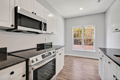 This updated 2-bedroom, 2-bath second-floor condo offers a - photo 17