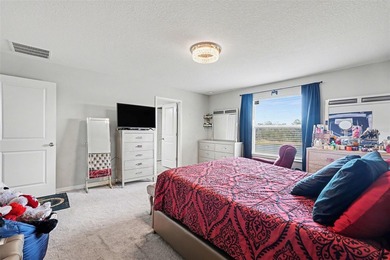 Florida living meets modern comfort with serene water views in - photo 14
