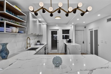 This is a Wow! Breathtaking waterfront living in desirable