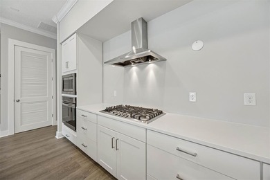 Experience coastal living at its finest in this like new