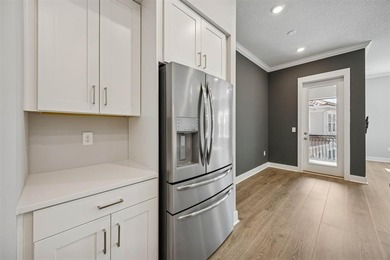 Experience coastal living at its finest in this like new