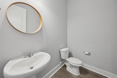 Experience coastal living at its finest in this like new